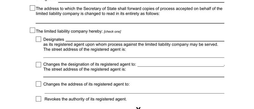 The county location within this, The limited liability company, and Designates as its registered agent inside Washington