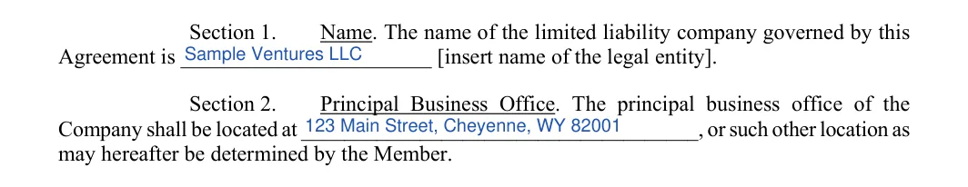 Wyoming LLC operating agreement: sections 1 and 2 name and office, filled with sample entries